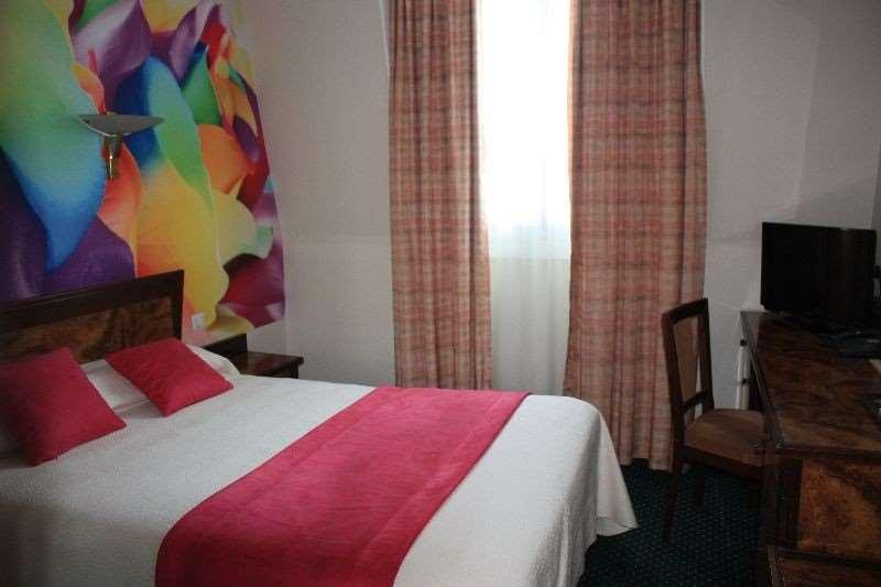Hotel Terminus Montparnasse Paris Quarto foto